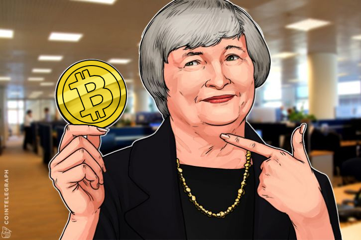 audience-member-holds-buy-bitcoin-sign-during-yellen-testimony